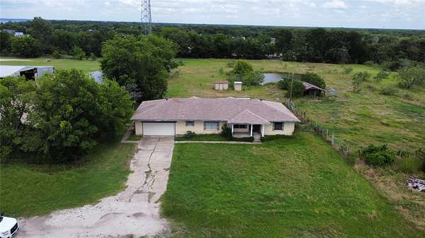 2.18 Acres of Land with Home for Sale in Quinlan, Texas