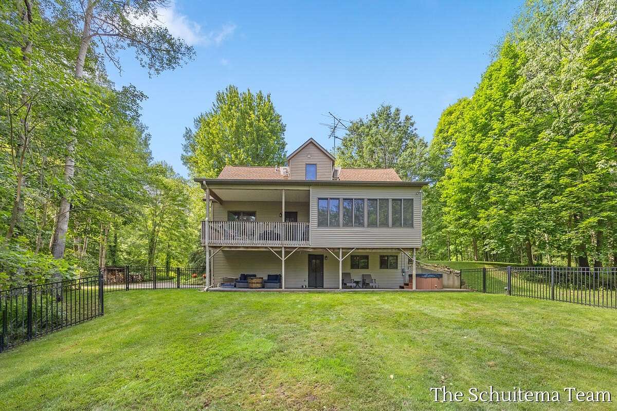 5.2 Acres of Land with Home for Sale in Rockford, Michigan