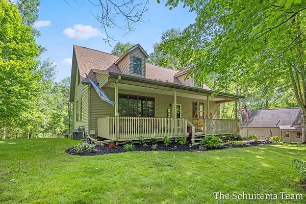 5.2 Acres of Land with Home for Sale in Rockford, Michigan