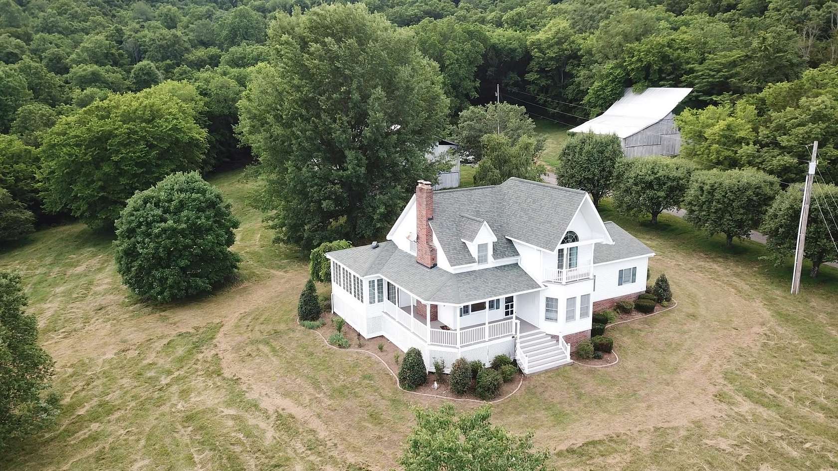 73.3 Acres of Land with Home for Auction in Pleasant Shade, Tennessee