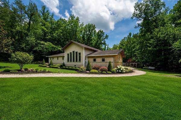 16.2 Acres of Recreational Land with Home for Sale in Linden, Tennessee