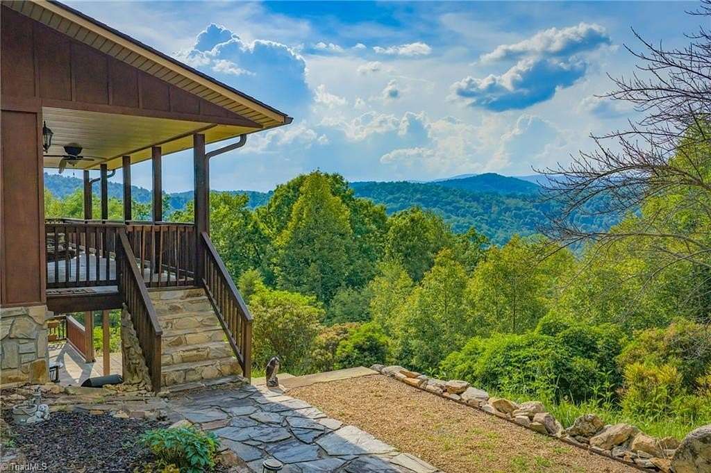 11.2 Acres of Recreational Land with Home for Sale in Purlear, North Carolina