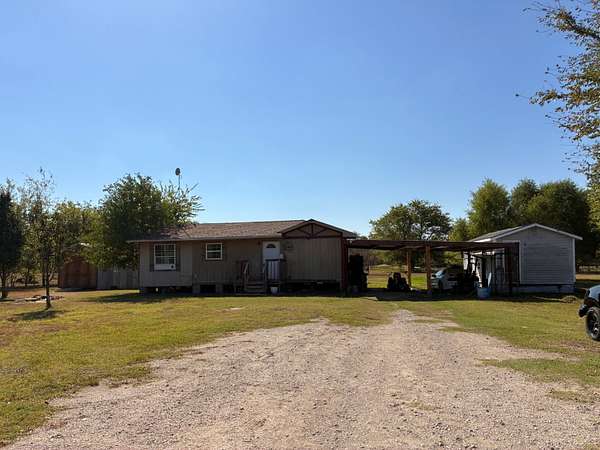 2.69 Acres of Land with Home for Sale in Terrell, Texas