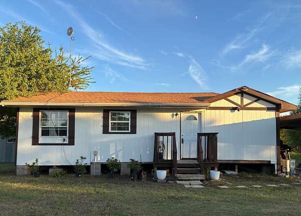 2.69 Acres of Land with Home for Sale in Terrell, Texas