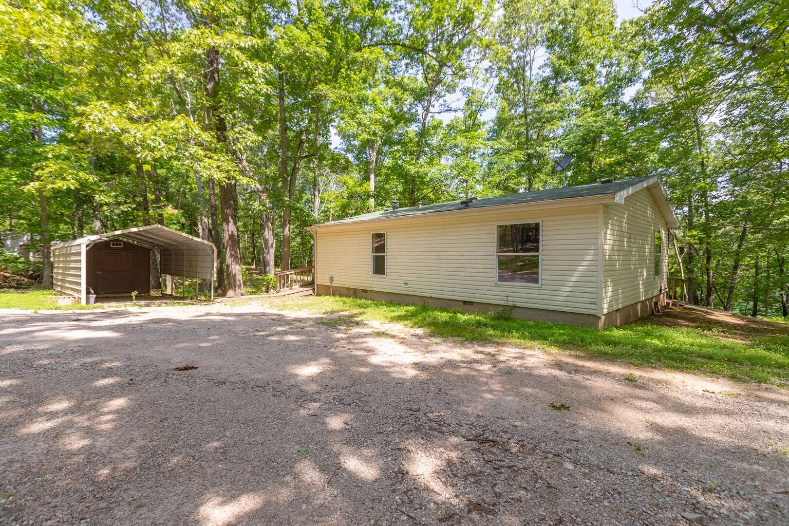 5.4 Acres of Land with Home for Sale in Shell Knob, Missouri