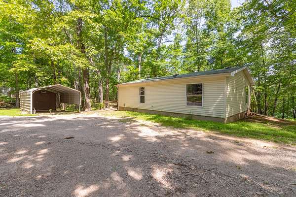 5.4 Acres of Land with Home for Sale in Shell Knob, Missouri
