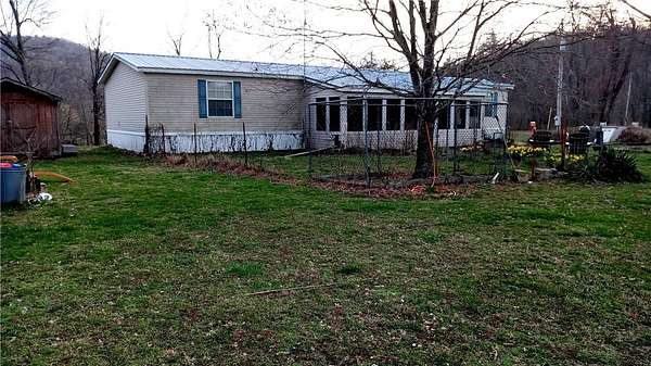 6.2 Acres of Land with Home for Sale in Green Forest, Arkansas