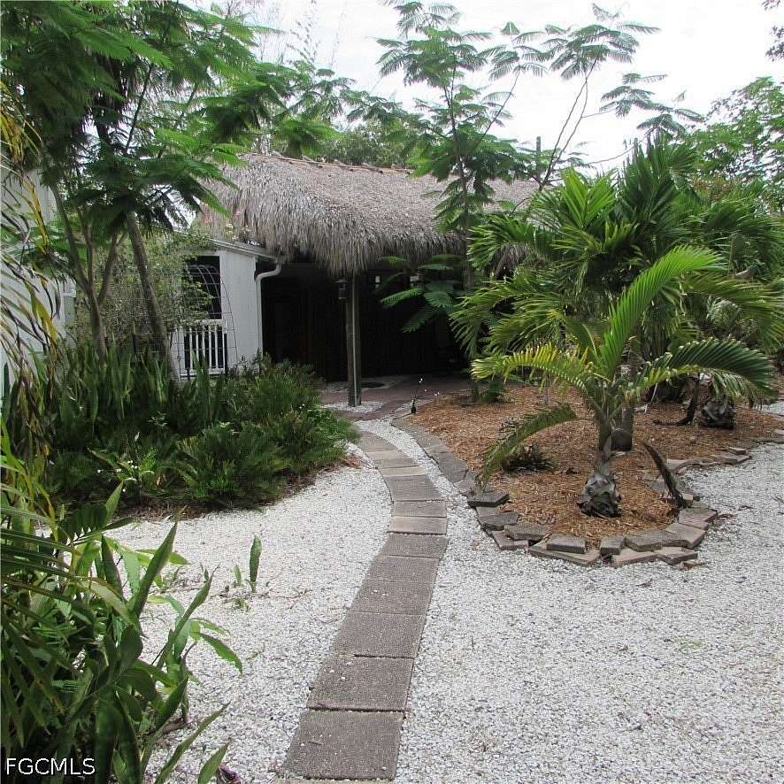 7.16 Acres of Land with Home for Sale in Bokeelia, Florida