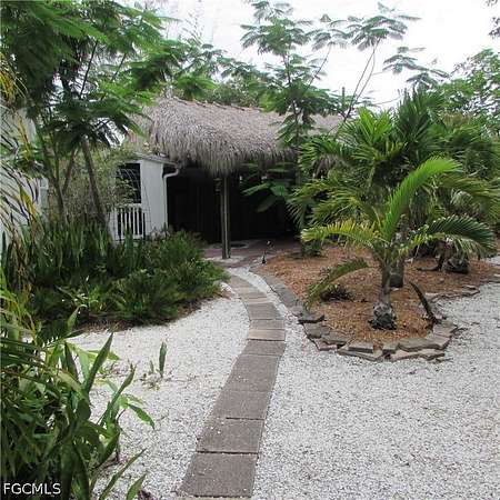 7.16 Acres of Land with Home for Sale in Bokeelia, Florida