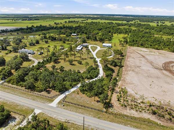 9.55 Acres of Land with Home for Sale in Myakka City, Florida