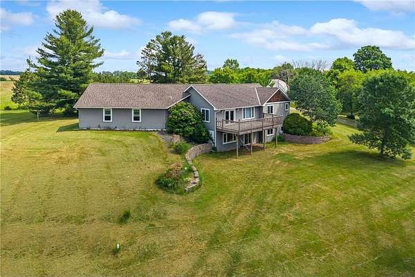 38.6 Acres of Agricultural Land with Home for Sale in Garfield Town, Wisconsin