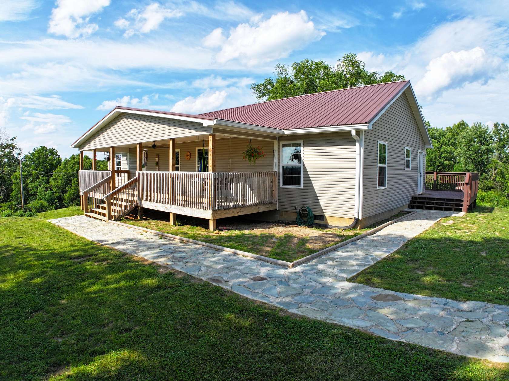 3 Acres of Land with Home for Sale in Irvine, Kentucky