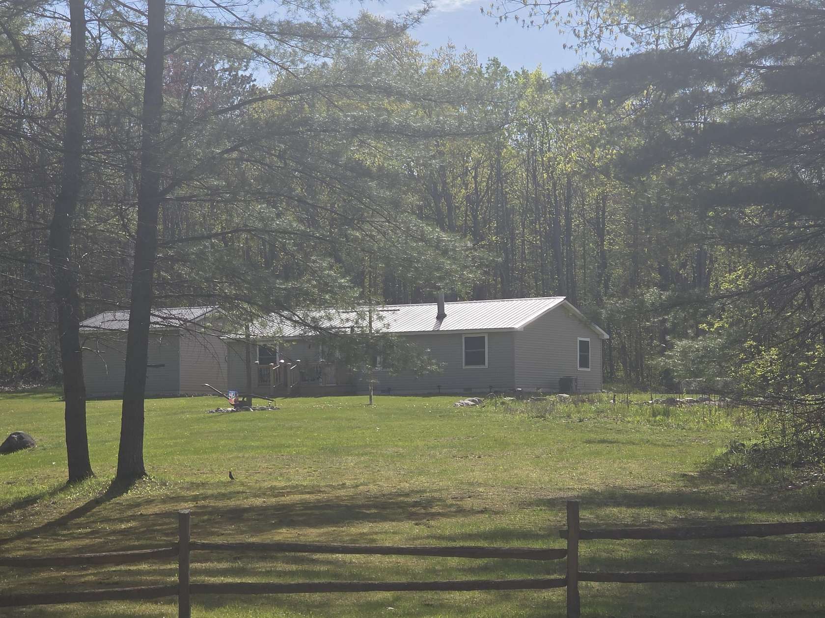 5.3 Acres of Land with Home for Sale in Barton City, Michigan