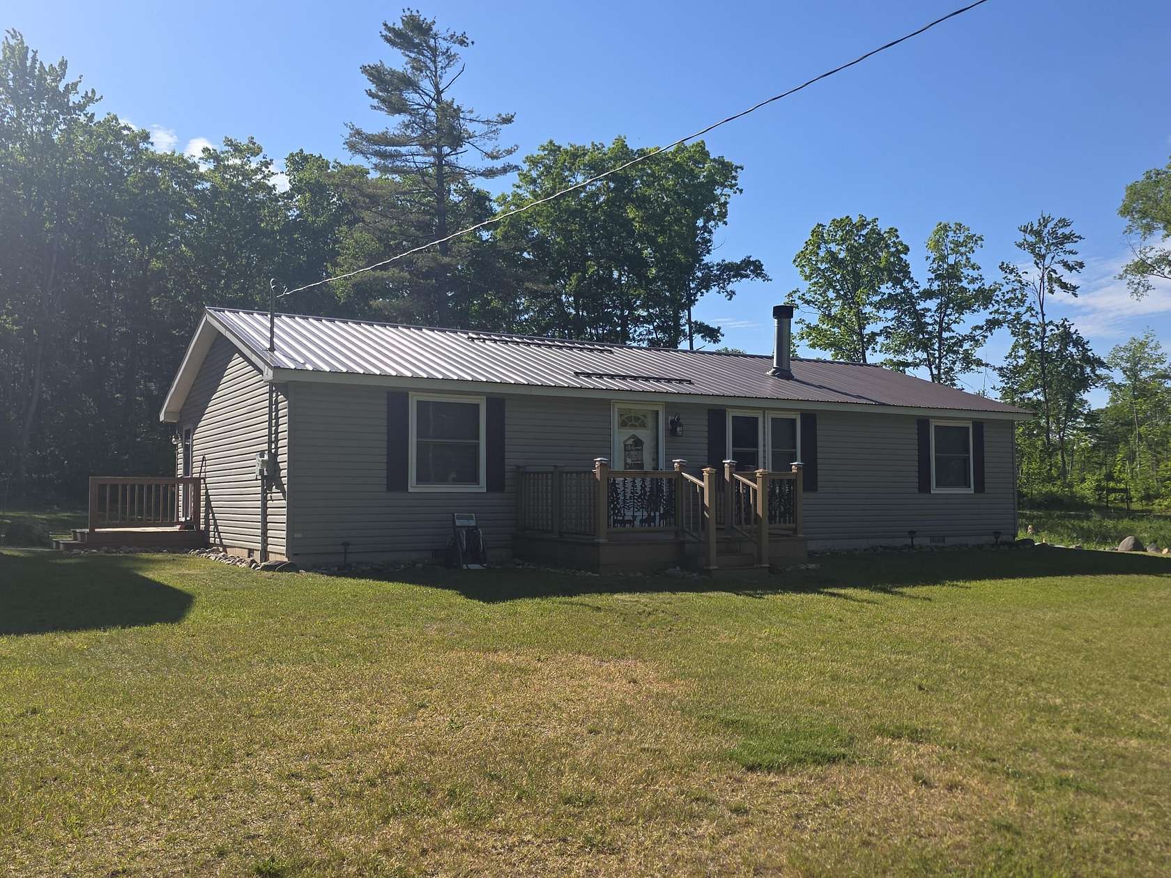 5.3 Acres of Land with Home for Sale in Barton City, Michigan
