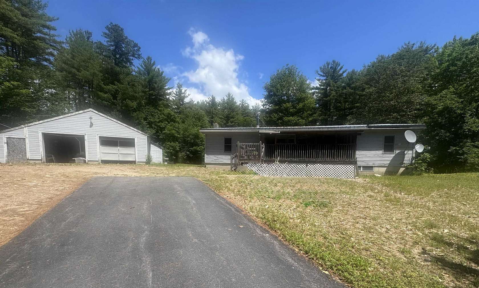 5.12 Acres of Land with Home for Sale in Middleton Town, New Hampshire