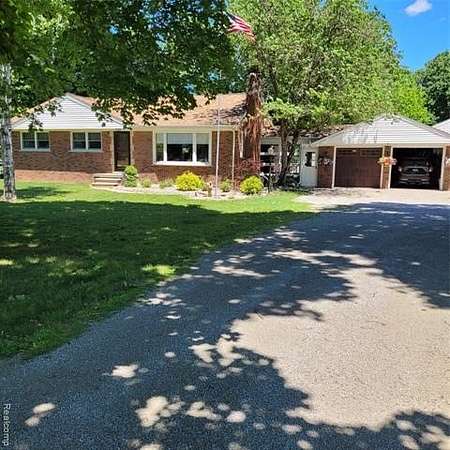 1.79 Acres of Land with Home for Sale in Flat Rock, Michigan