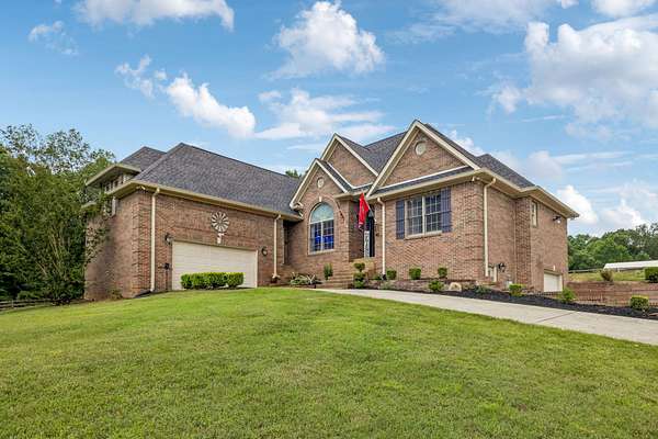 6.74 Acres of Land with Home for Sale in McEwen, Tennessee
