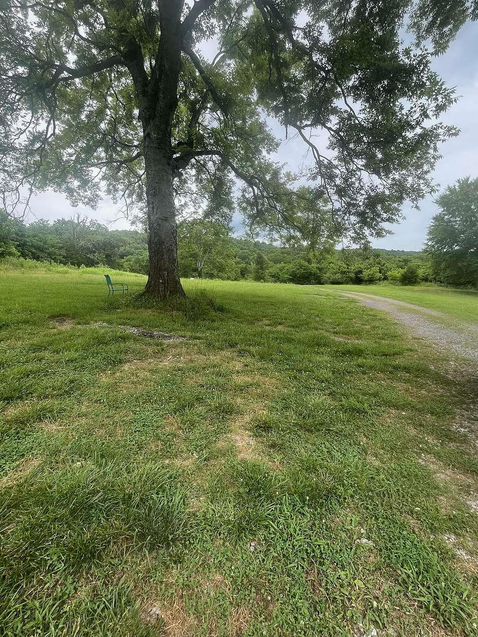 5 Acres of Land with Home for Sale in Brush Creek, Tennessee