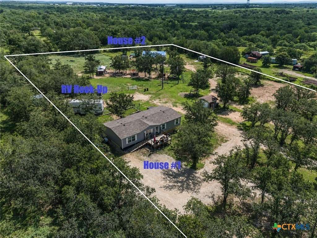 5 Acres of Land with Home for Sale in Luling, Texas
