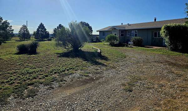 5 Acres of Land with Home for Sale in Moriarty, New Mexico