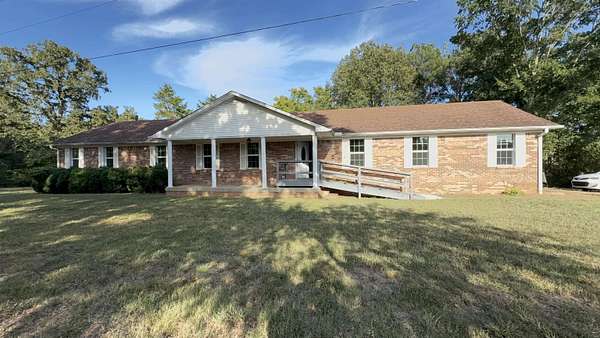 2 Acres of Land with Home for Sale in Selmer, Tennessee