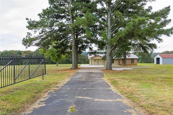 41.8 Acres of Land with Home for Sale in Mulberry, Arkansas