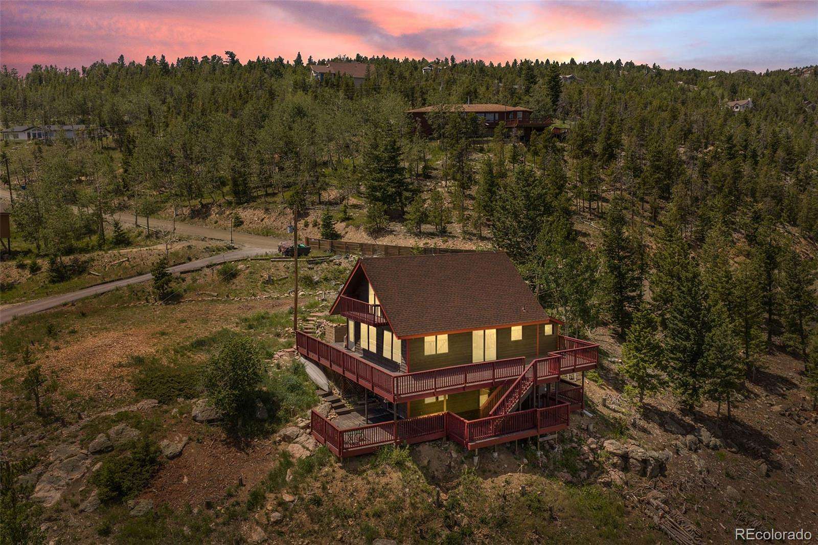 1.5 Acres of Land with Home for Sale in Evergreen, Colorado