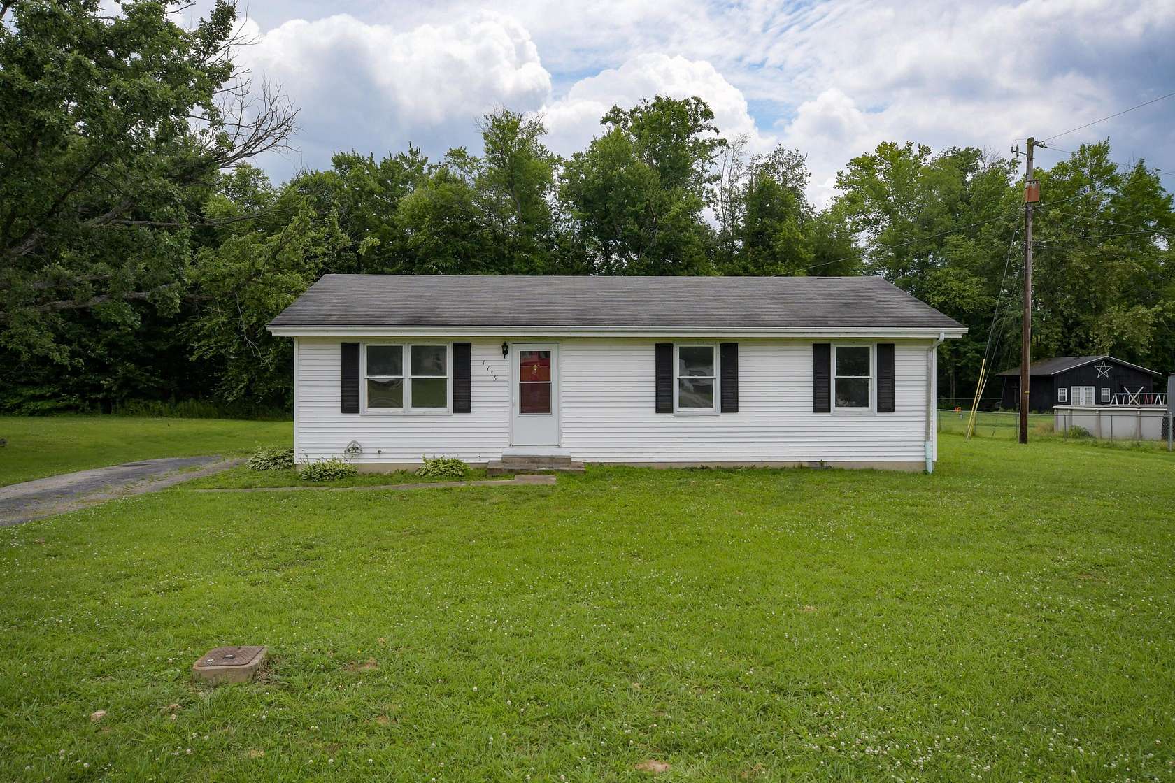 1.78 Acres of Land with Home for Auction in Jeffersonville, Kentucky