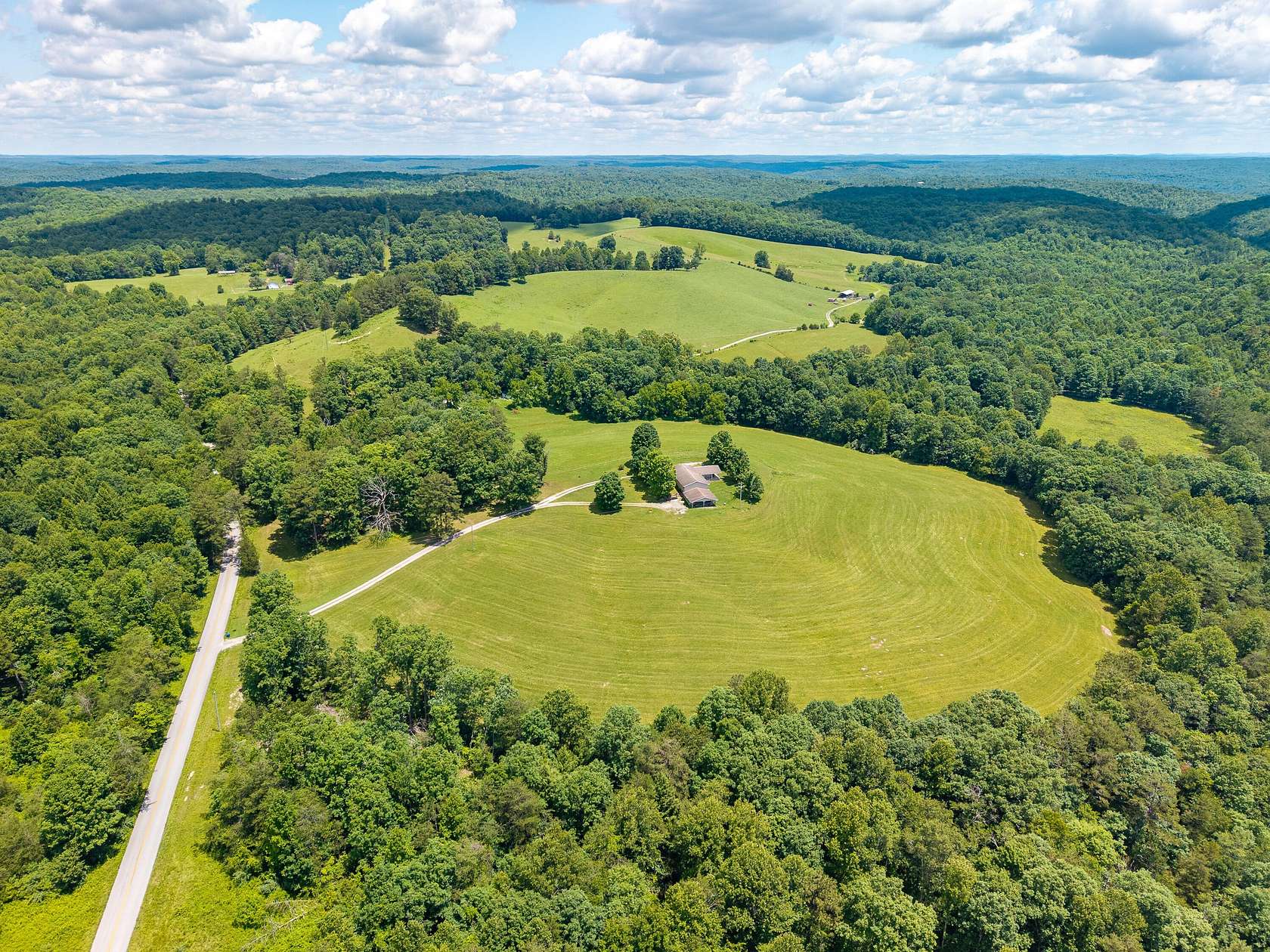 24.6 Acres of Land with Home for Sale in Parkers Lake, Kentucky