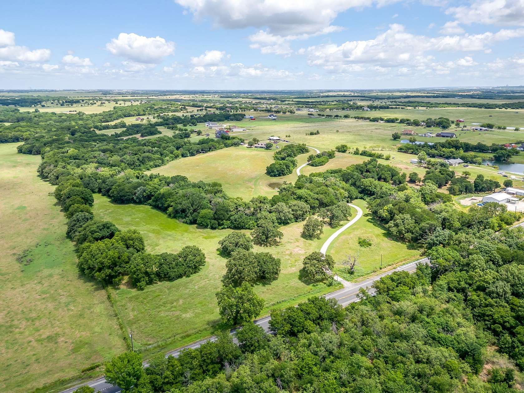 27.3 Acres of Land with Home for Sale in Grandview, Texas