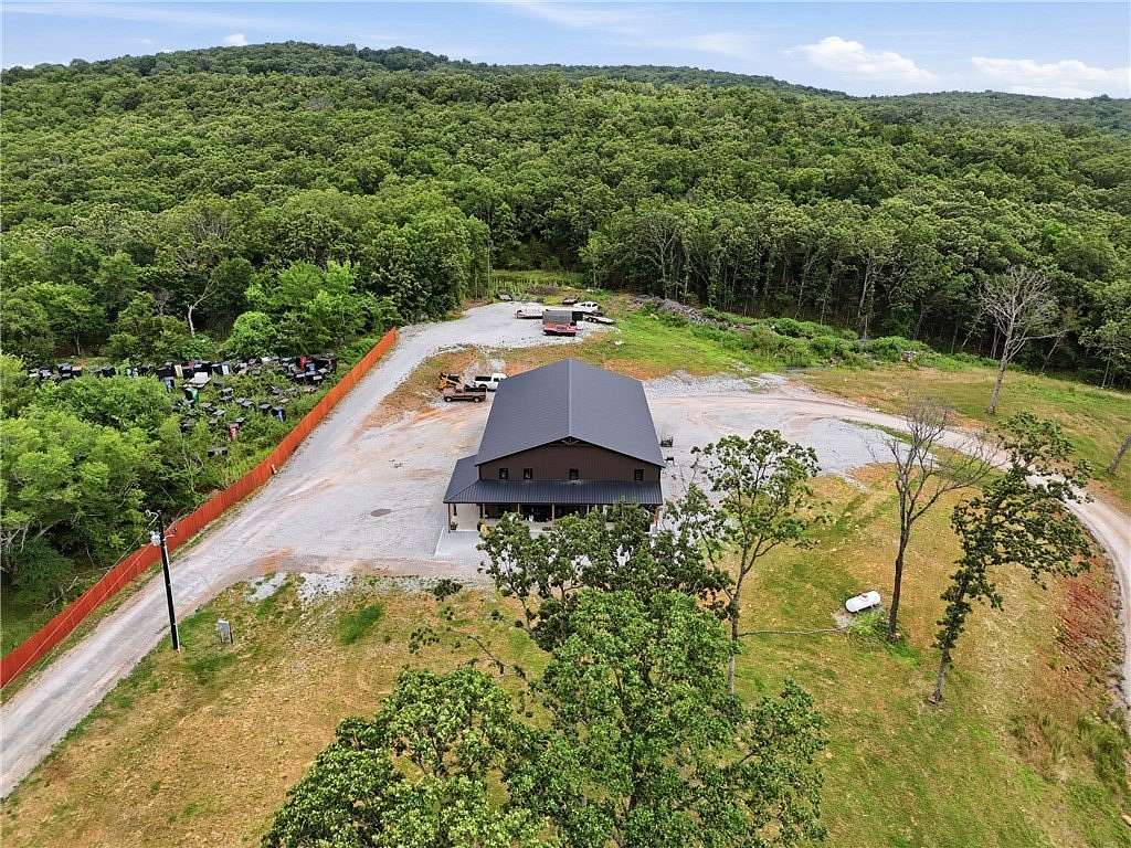 4.23 Acres of Land with Home for Sale in Elkins, Arkansas