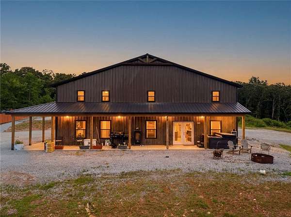 4.23 Acres of Land with Home for Sale in Elkins, Arkansas