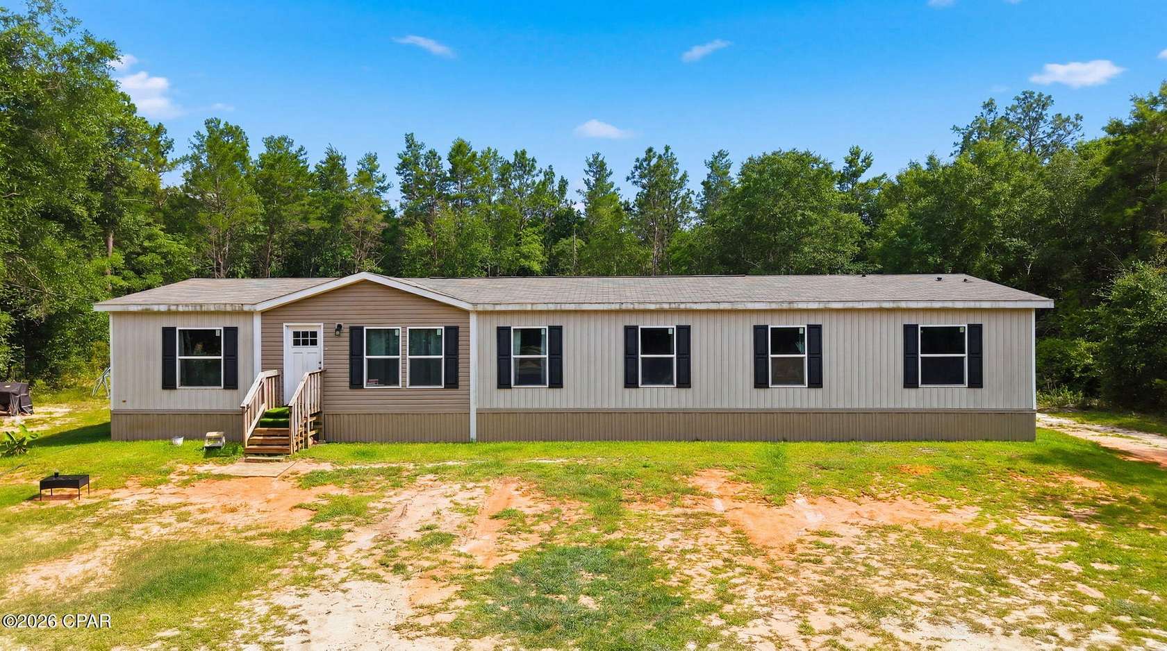 5.54 Acres of Land with Home for Sale in Milton, Florida