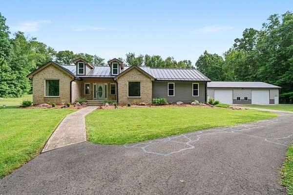 12.4 Acres of Land with Home for Sale in East Leroy, Michigan