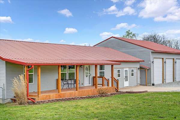 6.58 Acres of Land with Home for Sale in Sparta, Missouri