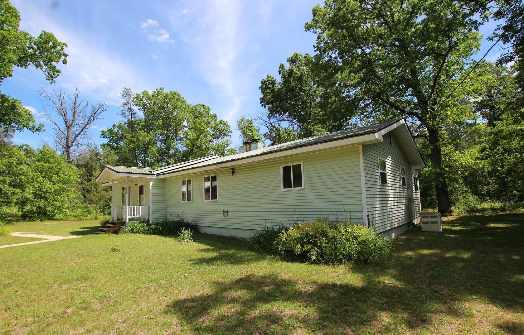 2 Acres of Land with Home for Sale in Idlewild, Michigan