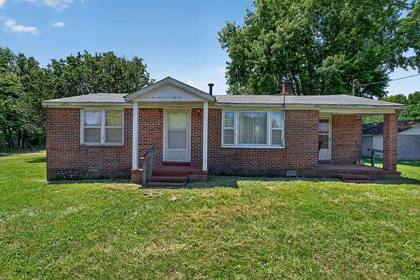 7.1 Acres of Land with Home for Auction in Smithville, Tennessee