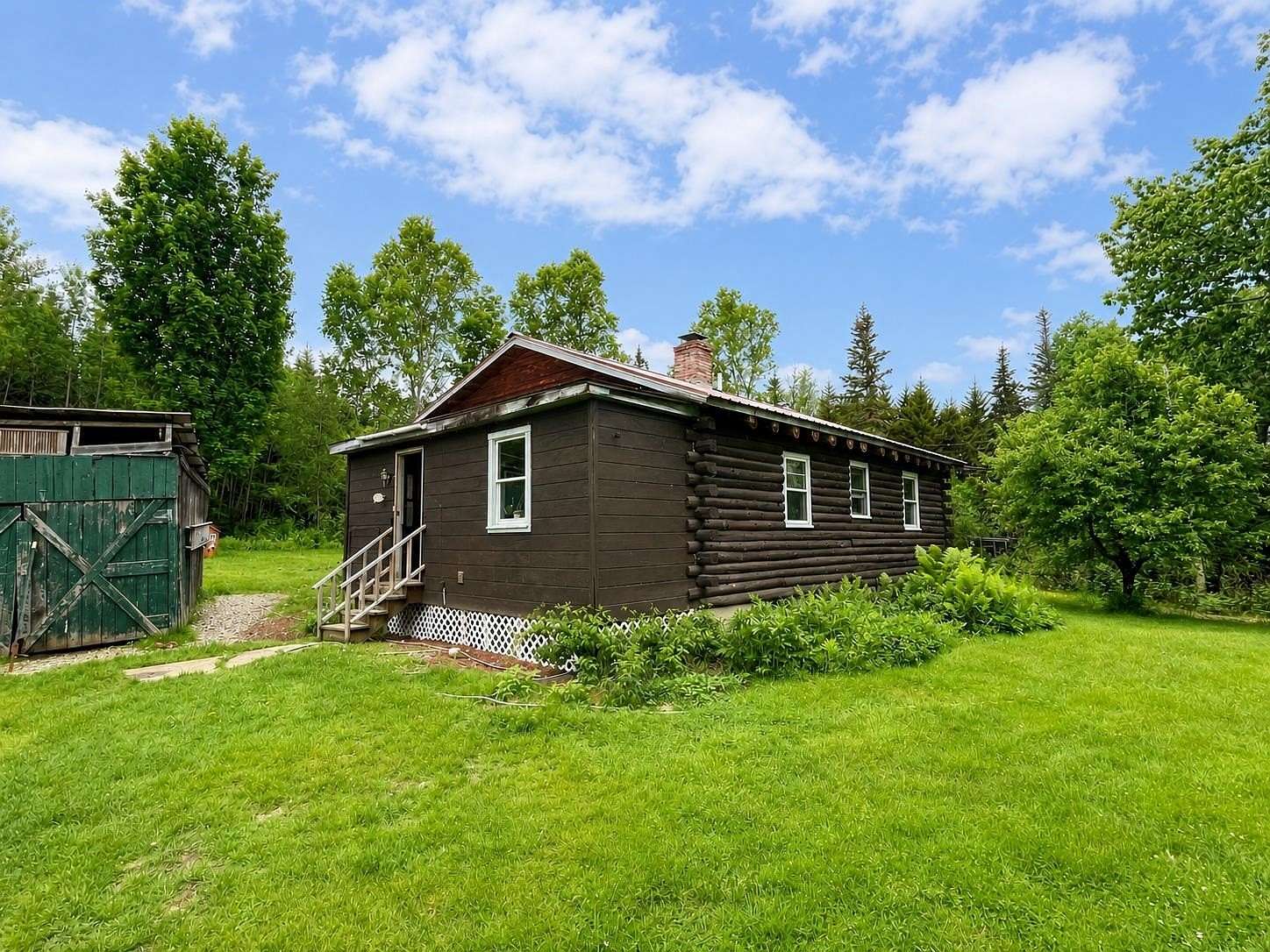 1.57 Acres of Land with Home for Sale in Milan, New Hampshire