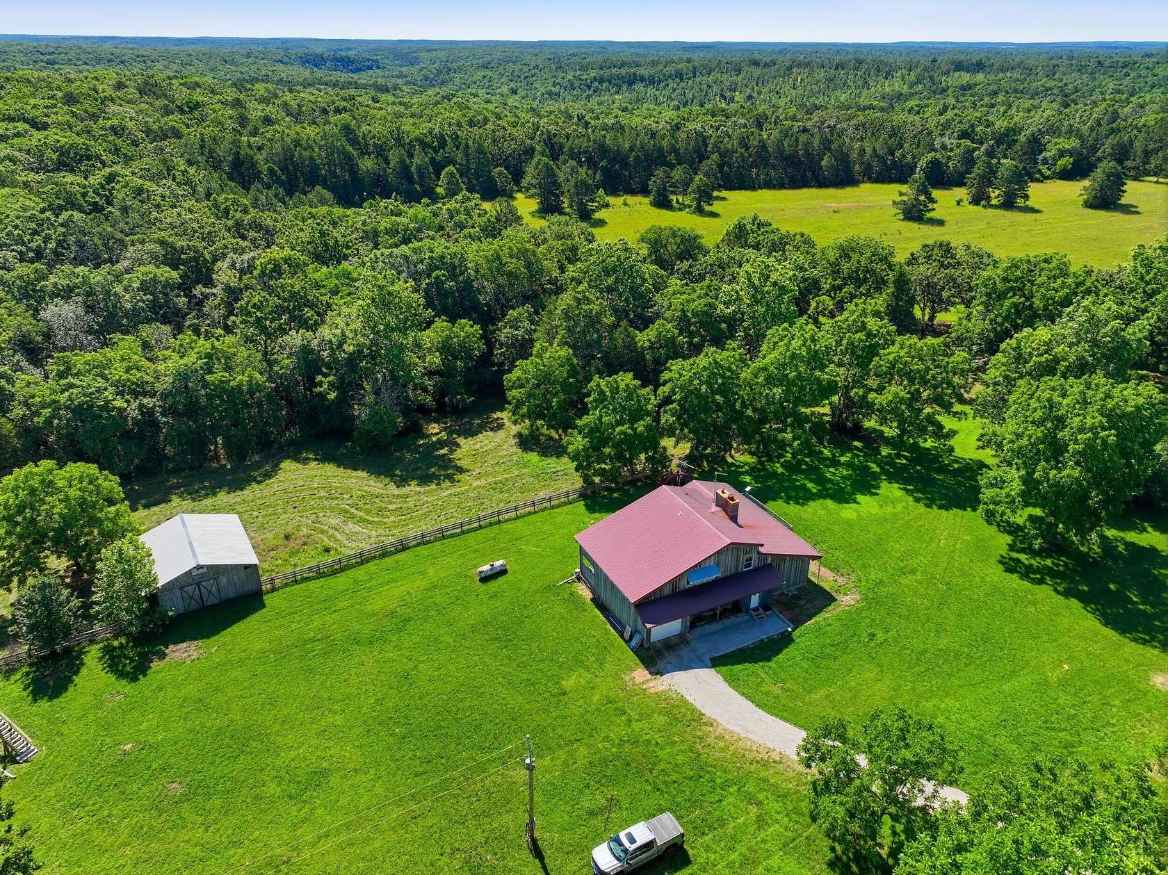 166 Acres of Land with Home for Sale in Bucyrus, Missouri
