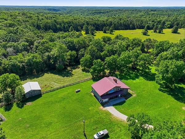 166 Acres of Land with Home for Sale in Bucyrus, Missouri