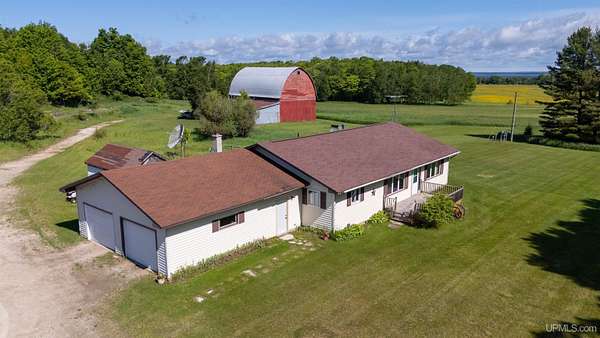43.7 Acres of Land with Home for Sale in Garden, Michigan