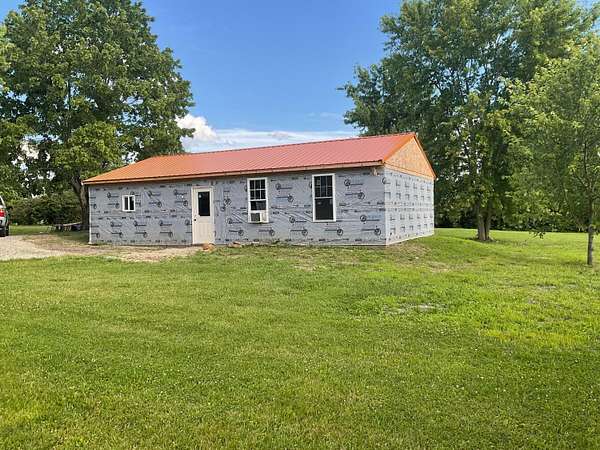 0.54 Acres of Land with Home for Sale in New Lexington, Ohio