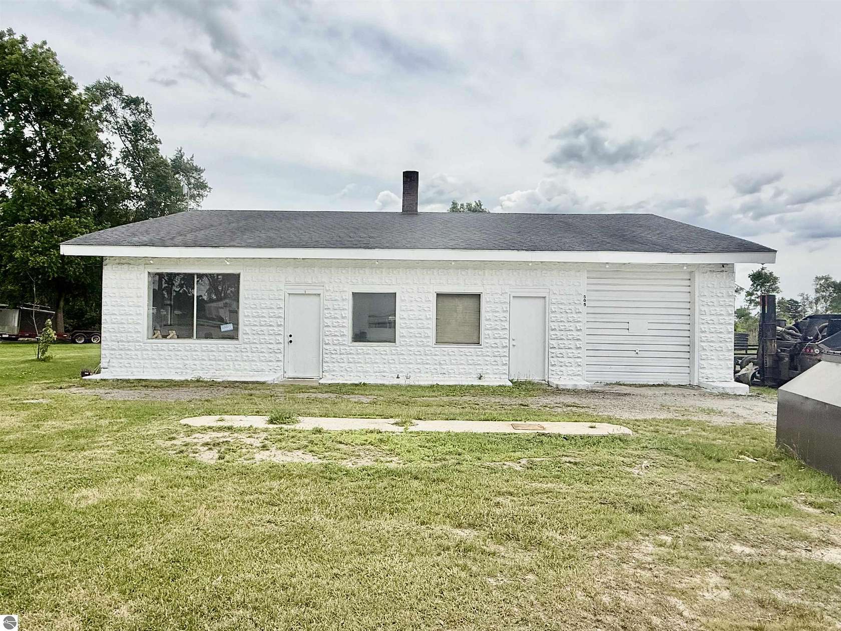 1.8 Acres of Improved Commercial Land for Auction in Breckenridge, Michigan