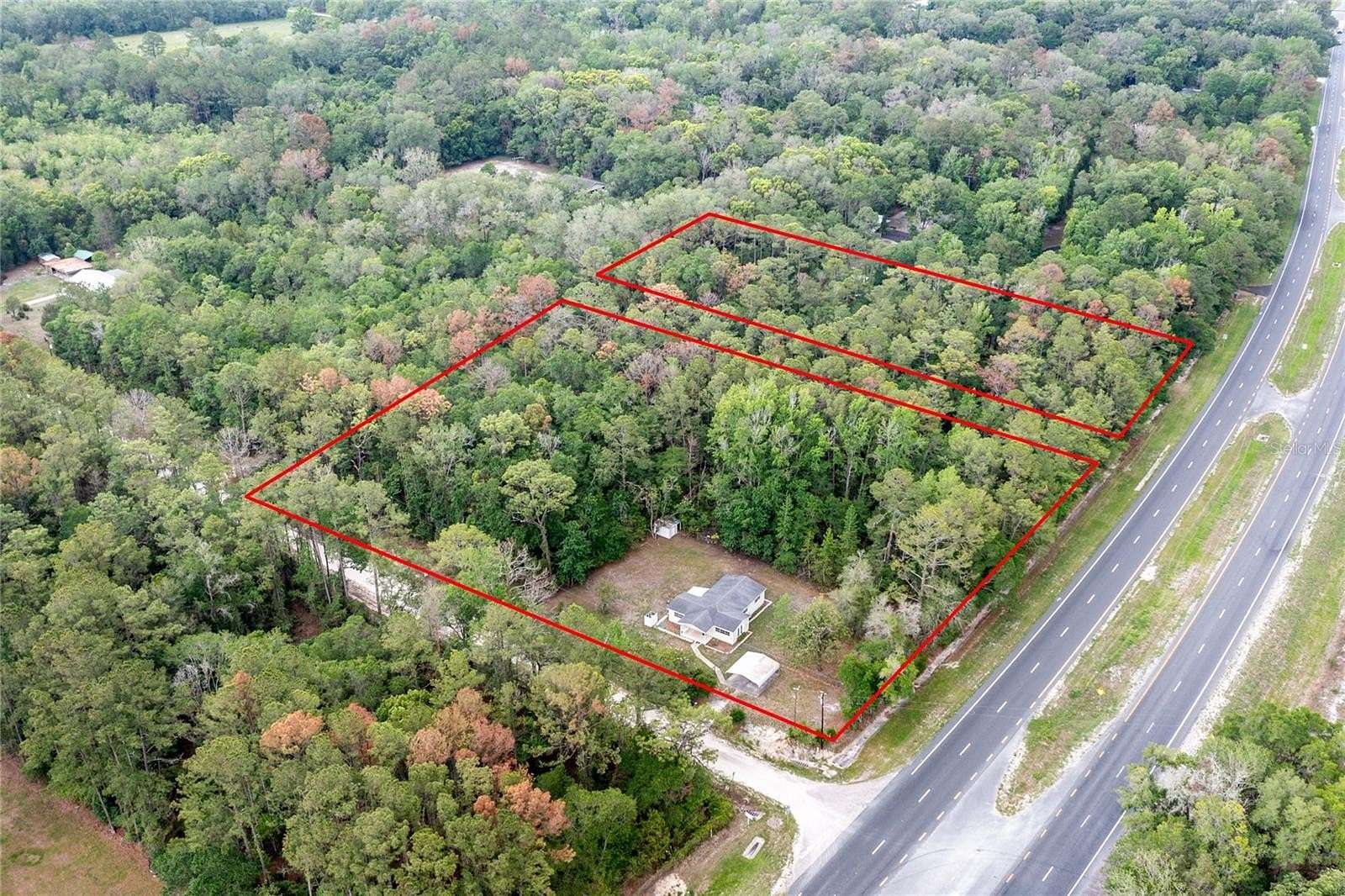 5.58 Acres of Land with Home for Sale in Hawthorne, Florida