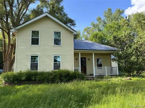2.75 Acres of Land with Home for Sale in Grass Lake, Michigan