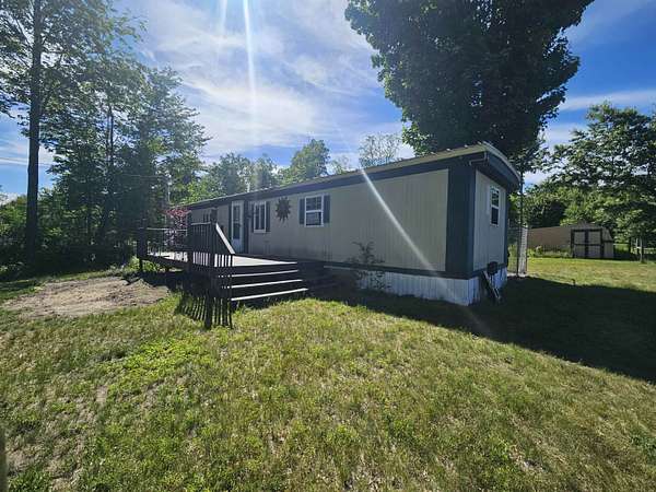 20 Acres of Recreational Land with Home for Sale in Harrison, Michigan