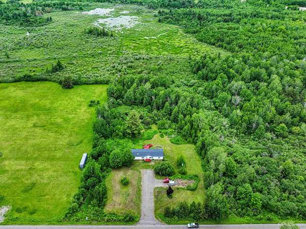 13.6 Acres of Land with Home for Sale in Houghton, Michigan