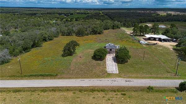 10.4 Acres of Land with Home for Sale in Stockdale, Texas