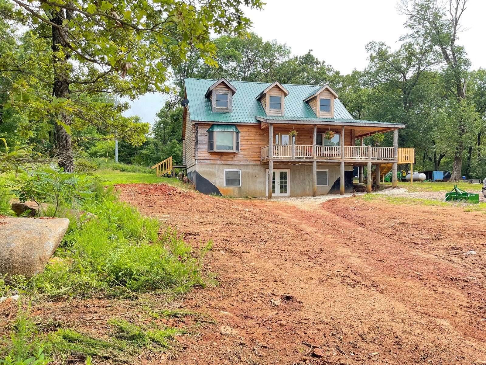 67.8 Acres of Land with Home for Sale in Mill Creek, Oklahoma
