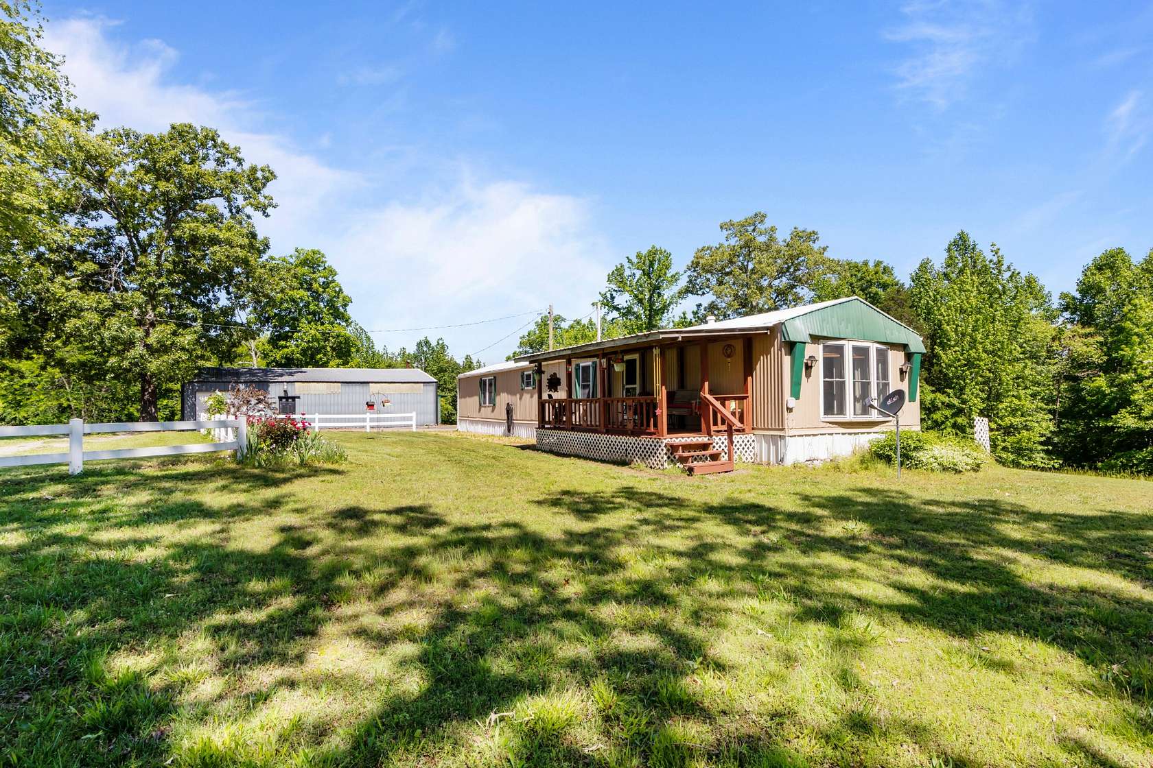 31 Acres of Recreational Land with Home for Sale in Camden, Tennessee